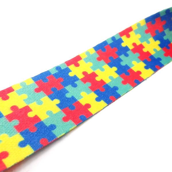 detalhe-fita-dupla-face-cracha-autismo-094712