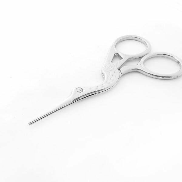 detalhe-tesoura-passaro-ut666-niq