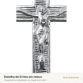 Detalhe do Cristo em relevo no crucifixo da Trindade níquel